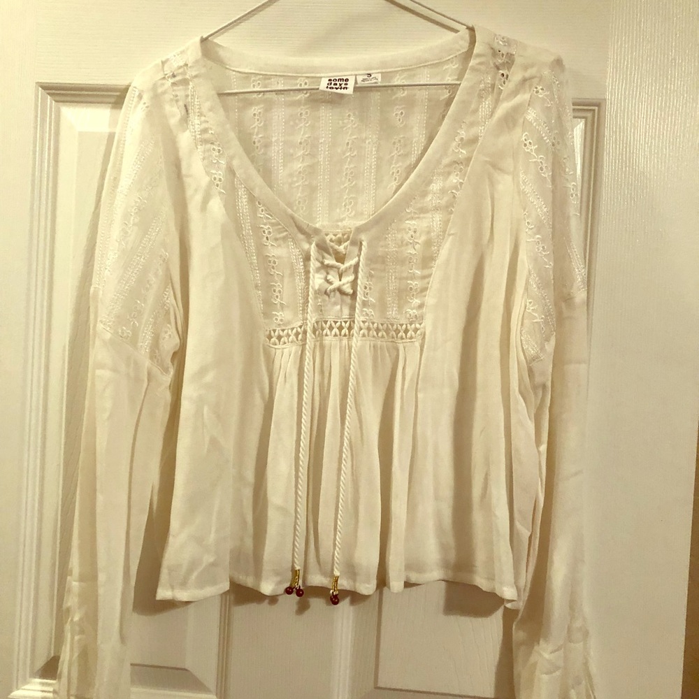 Almost crop top. Almost white.